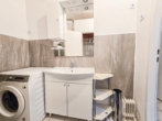 Wohnung 2) Badezimmer - Beherbergungswidmung vorhanden | Anleger-​Apartment mit Kurzzeitvermietungspotenzial