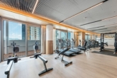 Fitnessbereich - 30. Stock – Skyline-​View – Danube Flats