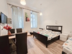 Wohn-/Schlafzimmer - Airbnb-​Apartment in beliebter Lage des 2. Bezirks zu verkaufen!