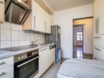 Küche - Attraktive 3‑Zimmer-​Wohnung mit Gemeinschaftsgarten und Parkplatz