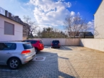 Parkplatz - Attraktive 3‑Zimmer-​Wohnung mit Gemeinschaftsgarten und Parkplatz
