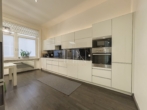 Küche mit Essbereich - Altbauliebe trifft Wiener Klassik – 124m² Stil und Eleganz im 4. Bezirk